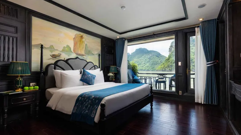 Balcony cabin looking out on karsts during a two-day Ha Long Bay junk boat cruise to Lan Ha Bay from Hanoi