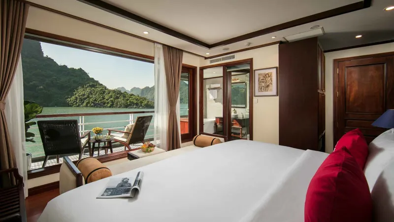 Junior suite with a balcony door onto the bay on a two-day Ha Long Bay junk boat cruise to Lan Ha Bay, Vietnam